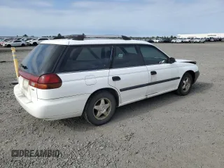 1997 Subaru Legacy L with VIN 4S3BK4359V7309059, listed as a Copart auction lot 59600835 with 136,620 mi miles and Salvage title. Bid and sale history available at DreamBid. Image 3.
