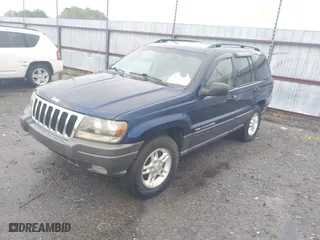 2002 Jeep Grand Cherokee Laredo with VIN 1J4GW48S22C244433, listed as a IAAI auction lot 41892912 with 256,393 mi miles. Bid and sale history available at carsss.com. Image 2.