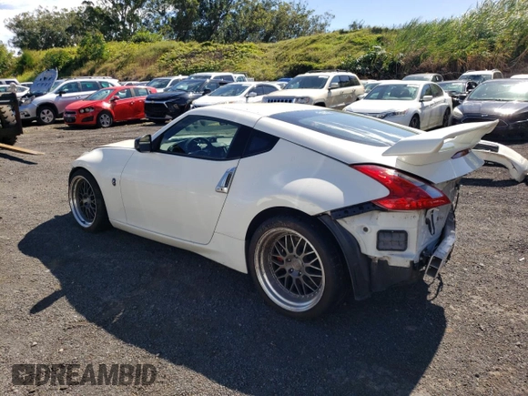 2014 Nissan 370Z Nismo with VIN JN1AZ4EH2EM630833, listed as a Copart auction lot 81773274 with 38,051 mi miles and Salvage Title. Bid and sale history available at DreamBid. Image 2.