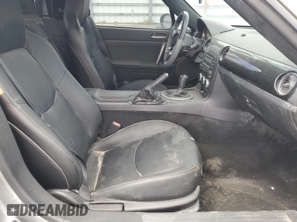 2015 Mazda MX-5 Miata Grand Touring z VIN JM1NC2PF0F0238698, wystawiony jako Copart lot #55455395 z przebiegiem Nie podano mil oraz Szkody całkowita. Historia ofert i sprzedaży dostępna na DreamBid. Obrazek 7.