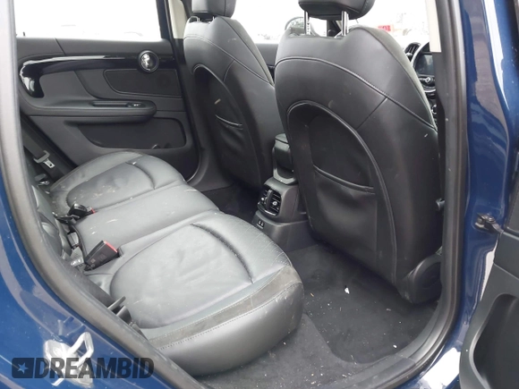 2019 MINI Countryman Cooper S z VIN WMZYT5C54K3G92704, wystawiony jako IAAI lot #41821521 z przebiegiem 95 087 mil mil oraz . Historia ofert i sprzedaży dostępna na DreamBid. Obrazek 8.