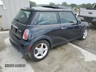2005 MINI Hardtop with VIN WMWRC33595TJ72148, listed as a Copart auction lot 54310325 with 189,243 mi miles and Salvage title. Bid and sale history available at DreamBid. Image 3.