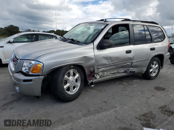 2006 GMC Envoy SLE with VIN 1GKDT13S462228967, listed as a Copart auction lot 73669484 with 233,349 mi miles and Salvage Title. Bid and sale history available at DreamBid. Image 1.