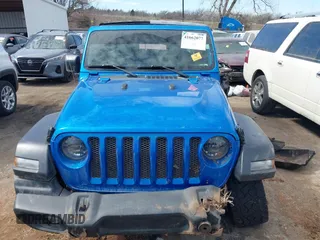 2023 Jeep Wrangler Sport S with VIN 1C4HJXDN6PW592915, listed as a IAAI auction lot 41662077 with 43,129 mi miles and . Bid and sale history available at DreamBid. Image 13.