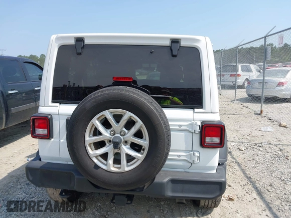 2023 Jeep Wrangler Willys z VIN 1C4HJXDG9PW545749, wystawiony jako IAAI lot #42307373 z przebiegiem 44 176 mil mil oraz . Historia ofert i sprzedaży dostępna na DreamBid. Obrazek 16.
