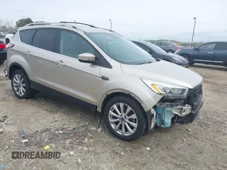 2017 Ford Escape Titanium with VIN 1FMCU0JD2HUC30884, listed as a IAAI auction lot 41801272 with 111,644 mi miles. Bid and sale history available at carsss.com. Image 1.