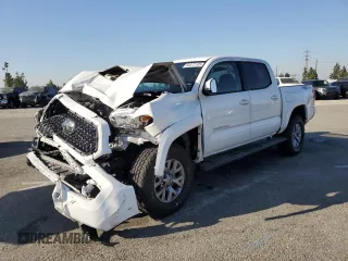 2018 Toyota Tacoma SR5 с VIN 3TMAZ5CN1JM075934, выставлен на аукционе Copart как лот 64372105 с пробегом 127 293 миль миль и Списание • Salvage title. История ставок и продаж доступна на DreamBid. Изображение 1.