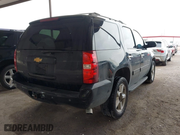 2013 Chevrolet Tahoe LS with VIN 1GNSCAE01DR121580, listed as a IAAI auction lot 41714743 with 257,616 mi miles and . Bid and sale history available at DreamBid. Image 4.