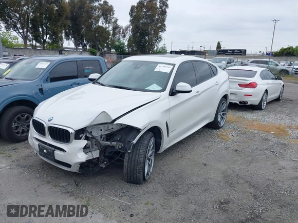 2018 BMW X6 xDrive35i with VIN 5UXKU2C5XJ0X50408, listed as a IAAI auction lot 41798784 with 69,134 mi miles. Bid and sale history available at carsss.com. Image 2.