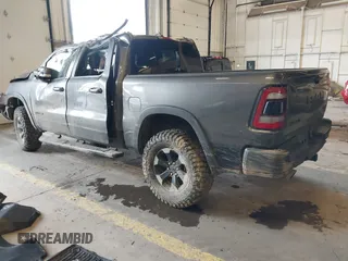 2020 Ram 1500 Rebel with VIN 1C6SRFLT0LN162491, listed as a IAAI auction lot 41841159 with 58,265 mi miles and . Bid and sale history available at DreamBid. Image 3.
