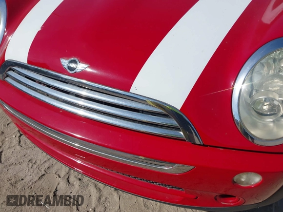 2006 MINI Hardtop with VIN WMWRC33506TK17012, listed as a IAAI auction lot 42076648 with 101,852 mi miles and . Bid and sale history available at DreamBid. Image 6.