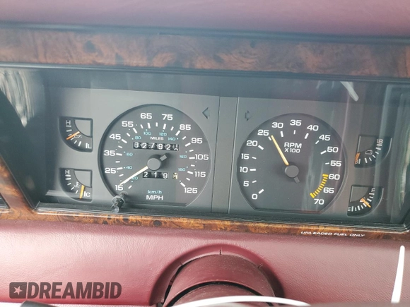 1989 Chrysler LeBaron z VIN 1C3XJ45J8KG223051, wystawiony jako Copart lot #75115464 z przebiegiem 27 923 mil mil oraz Szkody całkowita. Historia ofert i sprzedaży dostępna na DreamBid. Obrazek 9.