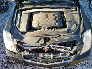 2013 Cadillac CTS Premium with VIN 1G6DS5E35D0149394, listed as a Copart auction lot 77005854 with 92,197 mi miles and Salvage title. Bid and sale history available at DreamBid. Image 12.