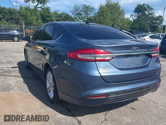 2018 Ford Fusion Hybrid SE with VIN 3FA6P0LU7JR261105, listed as a Copart auction lot 55692065 with 122,782 mi miles and Clean Title. Bid and sale history available at carsss.com. Image 3.