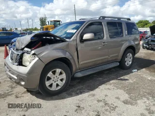 2006 Nissan Pathfinder SE with VIN 5N1AR18UX6C677079, listed as a Copart auction lot 69419734 with 179,928 mi miles and Salvage title. Bid and sale history available at DreamBid. Image 1.