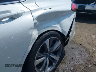 2021 Acura TLX Technology with VIN 19UUB5F42MA012008, listed as a IAAI auction lot 42154951 with 34,876 mi miles and . Bid and sale history available at DreamBid. Image 6.