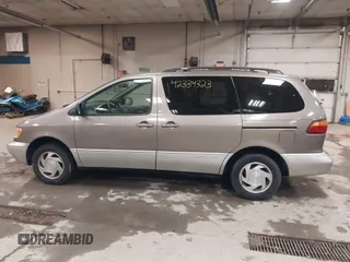 1999 Toyota Sienna LE z VIN 4T3ZF13CXXU127488, wystawiony jako IAAI lot #42334323 z przebiegiem 247 917 mil mil oraz . Historia ofert i sprzedaży dostępna na DreamBid. Obrazek 12.
