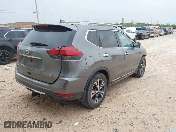 2017 Nissan Rogue SV with VIN 5N1AT2MT0HC889383, listed as a IAAI auction lot 42073498 with 319,134 mi miles and . Bid and sale history available at DreamBid. Image 4.