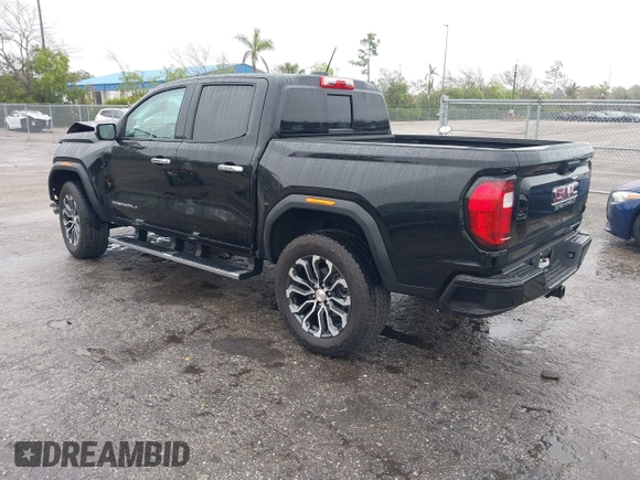 2024 GMC Canyon 4WD Denali with VIN 1GTP6FEK8R1133039, listed as a IAAI auction lot 41398204 with 7,735 mi miles and . Bid and sale history available at carsss.com. Image 3.
