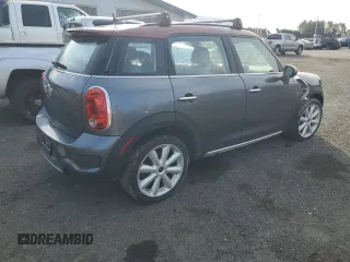 2016 MINI Countryman S z VIN WMWZC5C52GWP49650, wystawiony jako Copart lot #49153185 z przebiegiem 166 695 mil mil oraz Szkody całkowita. Historia ofert i sprzedaży dostępna na DreamBid. Obrazek 3.
