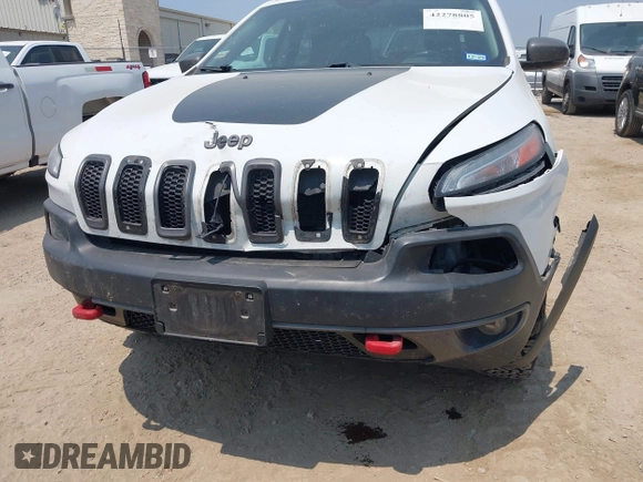 2015 Jeep Cherokee Trailhawk z VIN 1C4PJMBS5FW574102, wystawiony jako IAAI lot #42278805 z przebiegiem 164 250 mil mil oraz . Historia ofert i sprzedaży dostępna na DreamBid. Obrazek 6.