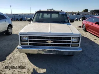 1990 Chevrolet Suburban with VIN 1GNER16K4LF170705, listed as a Copart auction lot 75886154 with 223,077 mi miles and Clean Title. Bid and sale history available at carsss.com. Image 5.