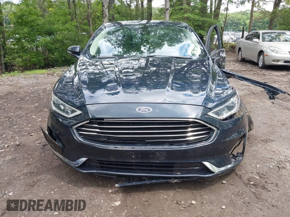 2020 Ford Fusion SEL with VIN 3FA6P0CD1LR180409, listed as a IAAI auction lot 42384311 with 39,163 mi miles and . Bid and sale history available at DreamBid. Image 12.