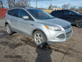 2013 Ford Escape SE with VIN 1FMCU9G98DUD51808, listed as a IAAI auction lot 41527022 with 141,471 mi miles. Bid and sale history available at carsss.com. Image 1.