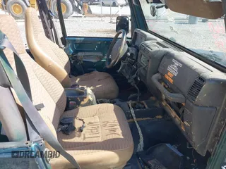 1998 Jeep Wrangler Sport with VIN 1J4FY19S2WP710055, listed as a IAAI auction lot 42680216 with Not provided miles and . Bid and sale history available at DreamBid. Image 5.