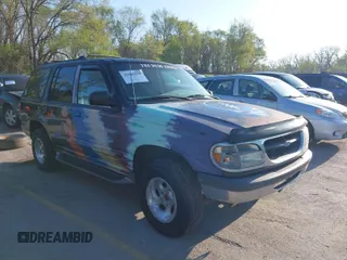 1997 Ford Explorer XL z VIN 1FMDU34E3VZB63849, wystawiony jako IAAI lot #42006890 z przebiegiem 296 782 mil mil oraz . Historia ofert i sprzedaży dostępna na DreamBid. Obrazek 1.