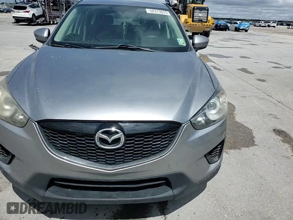 2014 Mazda CX-5 Sport with VIN JM3KE2BE1E0402185, listed as a Copart auction lot 52313675 with 140,398 mi miles and Salvage Title. Bid and sale history available at carsss.com. Image 12.