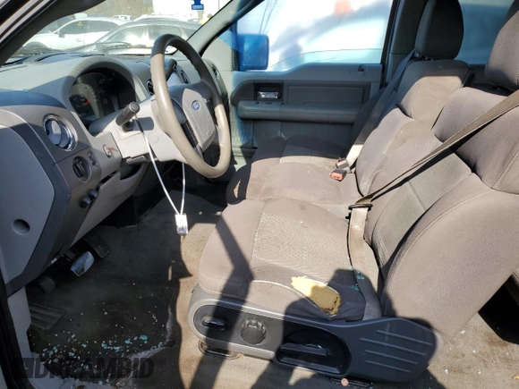 2006 Ford F-150 XLT with VIN 1FTPX14576NA19050, listed as a Copart auction lot 77426344 with 191,587 mi miles and Salvage title. Bid and sale history available at DreamBid. Image 7.