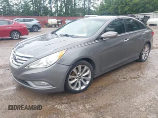 2012 Hyundai Sonata SE z VIN 5NPEC4AC7CH435022, wystawiony jako IAAI lot #42491555 z przebiegiem 176 670 mil mil oraz . Historia ofert i sprzedaży dostępna na DreamBid. Obrazek 2.