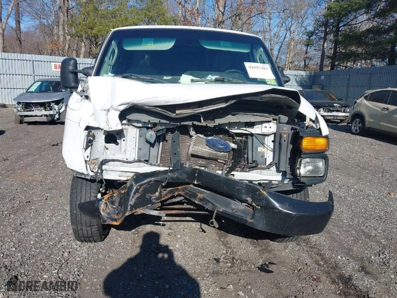 2012 Ford Econoline Cargo Van Commercial with VIN 1FTNE2EL7CDA53538, listed as a IAAI auction lot 41697483 with 142,154 mi miles. Bid and sale history available at carsss.com. Image 6.