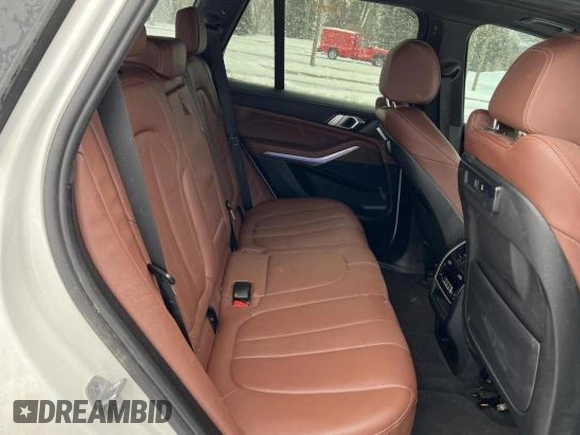 2021 BMW X5 xDrive40i with VIN 5UXCR6C03M9G52955, listed as a Copart auction lot 41009913 with 7,476 mi miles. Bid and sale history available at carsss.com. Image 6.