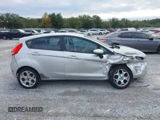 2011 Ford Fiesta SES with VIN 3FADP4FJ5BM232264, listed as a IAAI auction lot 40982622 with 184,726 mi miles. Bid and sale history available at carsss.com. Image 13.