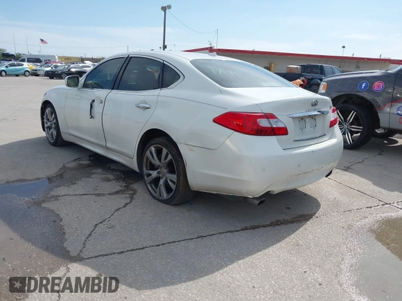 2013 Infiniti M with VIN JN1BY1AP4DM511067, listed as a IAAI auction lot 41890196 with 316,837 mi miles and . Bid and sale history available at DreamBid. Image 3.