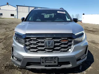 2022 Honda Passport TrailSport z VIN 5FNYF8H61NB026883, wystawiony jako Copart lot #49298085 z przebiegiem 18 600 mil mil oraz Szkoda całkowita • Salvage title. Historia ofert i sprzedaży dostępna na DreamBid. Obrazek 5.