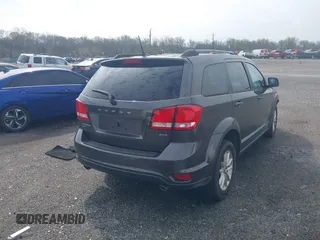 2017 Dodge Journey SXT with VIN 3C4PDDBG5HT618563, listed as a IAAI auction lot 42015188 with 104,747 mi miles and . Bid and sale history available at DreamBid. Image 4.
