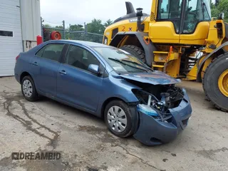 2009 Toyota Yaris z VIN JTDBT903594057816, wystawiony jako IAAI lot #41599648 z przebiegiem Nie podano mil oraz . Historia ofert i sprzedaży dostępna na DreamBid. Obrazek 1.