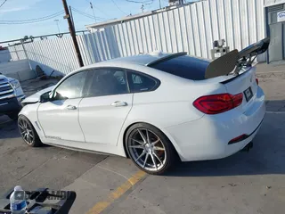 2018 BMW 4 Series 430i with VIN WBA4J1C59JBG77470, listed as a IAAI auction lot 41534689 with 141,710 mi miles and . Bid and sale history available at carsss.com. Image 14.