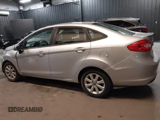 2012 Ford Fiesta SE with VIN 3FADP4BJ1CM110315, listed as a IAAI auction lot 39266357 with 144,749 mi miles. Bid and sale history available at carsss.com. Image 14.