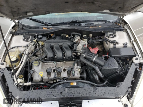 2008 Mercury Milan with VIN 3MEHM07138R649873, listed as a Copart auction lot 73098794 with 297,898 mi miles and Salvage title. Bid and sale history available at DreamBid. Image 13.