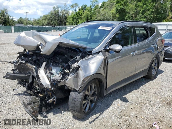 2017 Hyundai Santa Fe Ultimate z VIN 5XYZW4LA8HG491652, wystawiony jako Copart lot #56907985 z przebiegiem Nie podano mil oraz Szkoda całkowita • Salvage title. Historia ofert i sprzedaży dostępna na DreamBid. Obrazek 1.