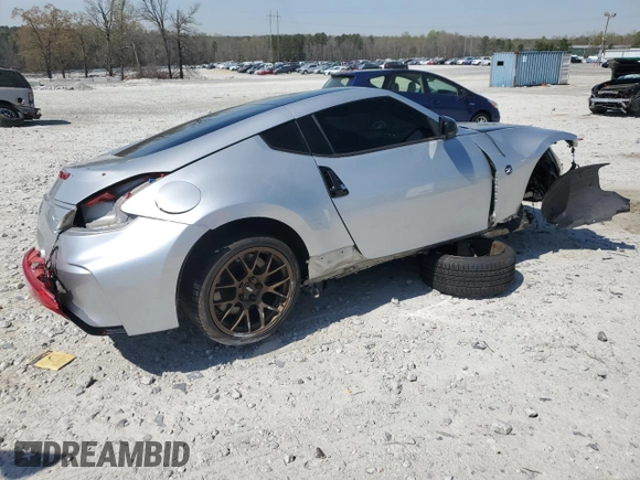 2009 Nissan 370Z Touring with VIN JN1AZ44E49M411367, listed as a Copart auction lot 50430355 with 74,909 mi miles and Salvage Title. Bid and sale history available at carsss.com. Image 3.