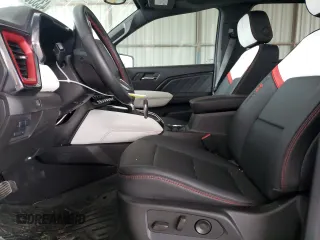 2024 GMC Canyon 4WD AT4X with VIN 1GTP6EEK1R1158021, listed as a Copart auction lot 43359665 with 14,120 mi miles and Salvage Title. Bid and sale history available at carsss.com. Image 7.