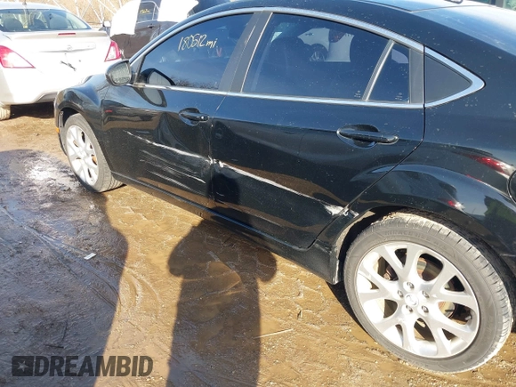 2009 Mazda 6 S Grand Touring with VIN 1YVHP82B195M23577, listed as a IAAI auction lot 41491398 with 180,512 mi miles and . Bid and sale history available at DreamBid. Image 6.