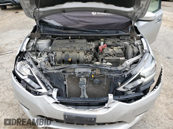 2018 Nissan Sentra S z VIN 3N1AB7AP6JY323420, wystawiony jako Copart lot #51597405 z przebiegiem 77 873 mil mil oraz Szkoda całkowita • Salvage title. Historia ofert i sprzedaży dostępna na DreamBid. Obrazek 12.