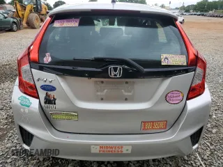 2015 Honda Fit LX z VIN 3HGGK5H58FM768130, wystawiony jako Copart lot #58184435 z przebiegiem 67 968 mil mil oraz Szkoda całkowita • Salvage title. Historia ofert i sprzedaży dostępna na DreamBid. Obrazek 6.