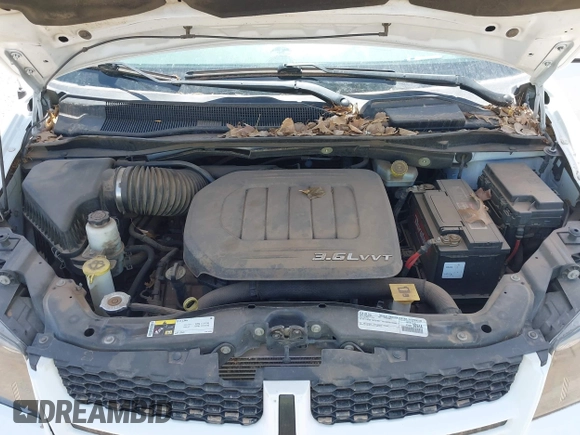 2016 Dodge Grand Caravan R/T with VIN 2C4RDGEG2GR265609, listed as a IAAI auction lot 42078392 with 105,861 mi miles and . Bid and sale history available at DreamBid. Image 10.